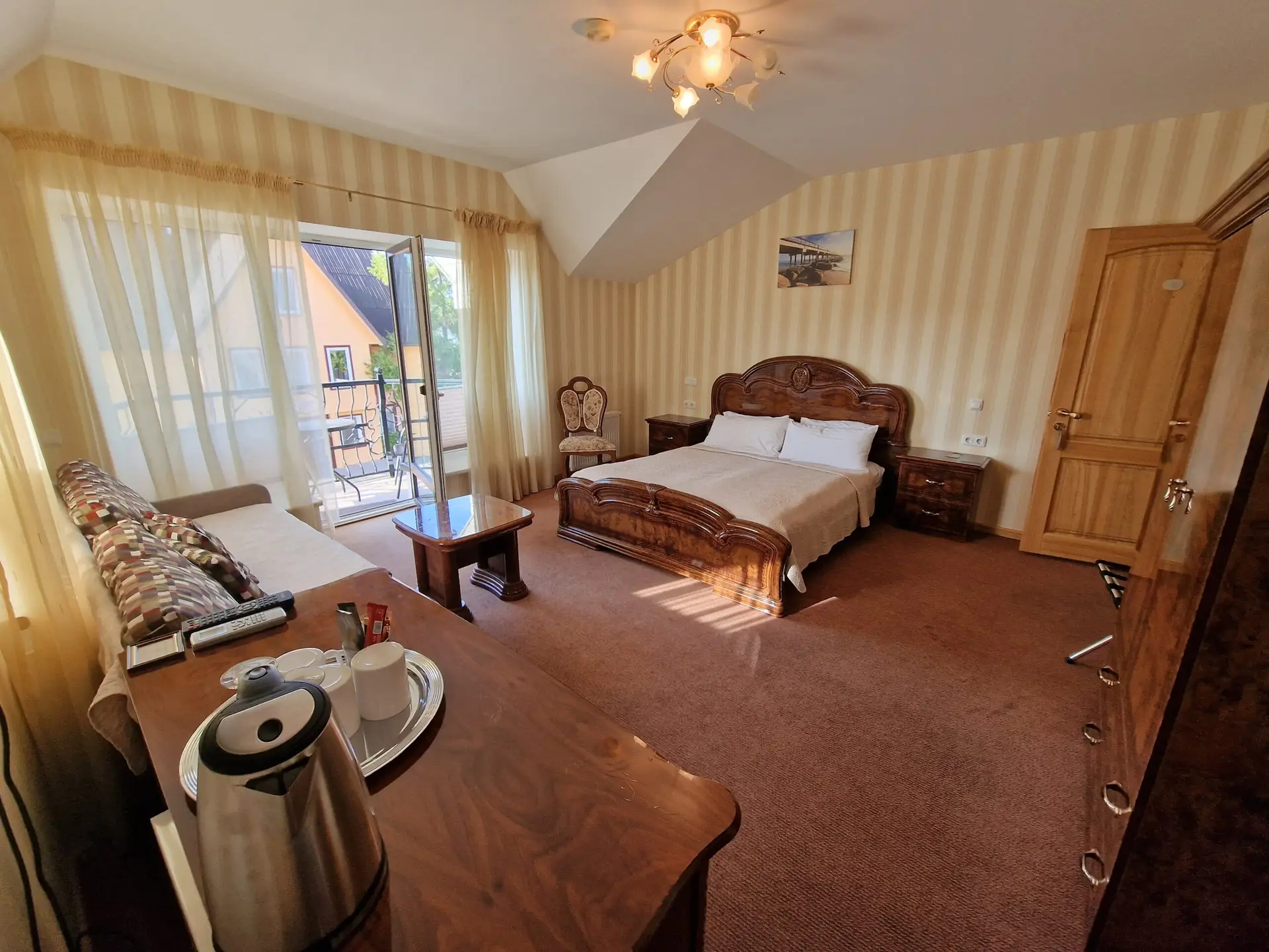 Apartamentai su balkonėliu